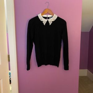 Black sweater with pretty collar. Size medium.